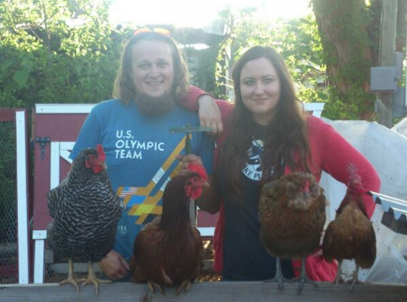 Brian and Stephanie Magby and their flock of chickens and roosters. 